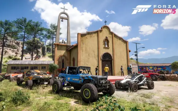 Wiele terenowych pojazdów przed kościołem w Meksyku. Idealna grafika, by sprawdzić forza horizon 5 wymagania.